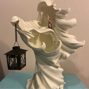 Acrylic ghost holding lantern